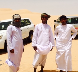 Drivers Relaxing in Arabian Desert